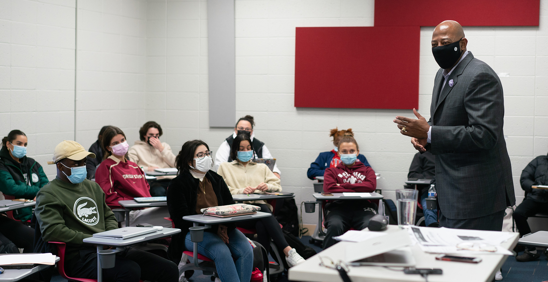Earl Cureton, right, speaks to Fr. Patrick Kelly, S.J.'s class during the fall semester.