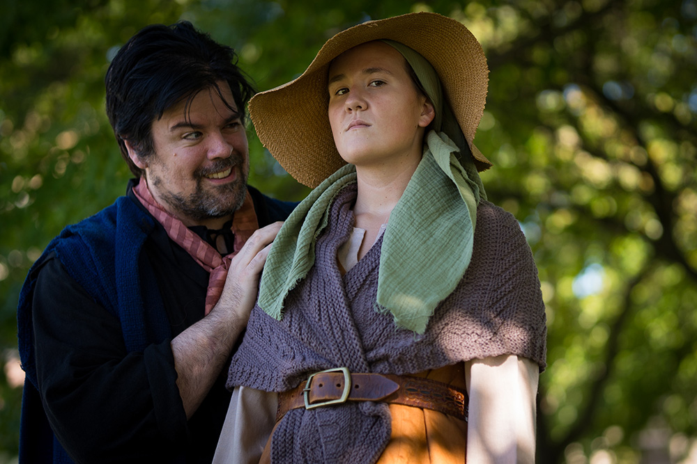 Two students featured in a promo shot for the production of 'Witch.'