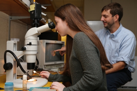 Dr. Jacob Kagey with a student in his lab