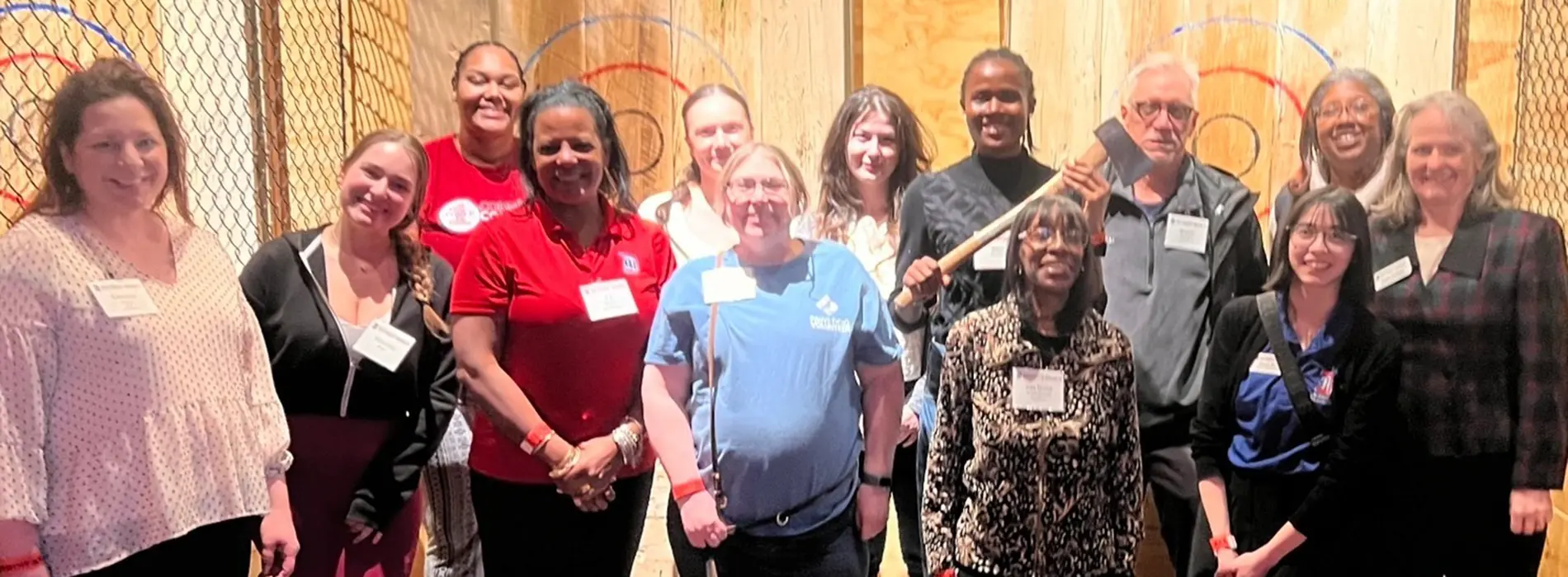 a group of alumni who showed up at the ax throwing evening