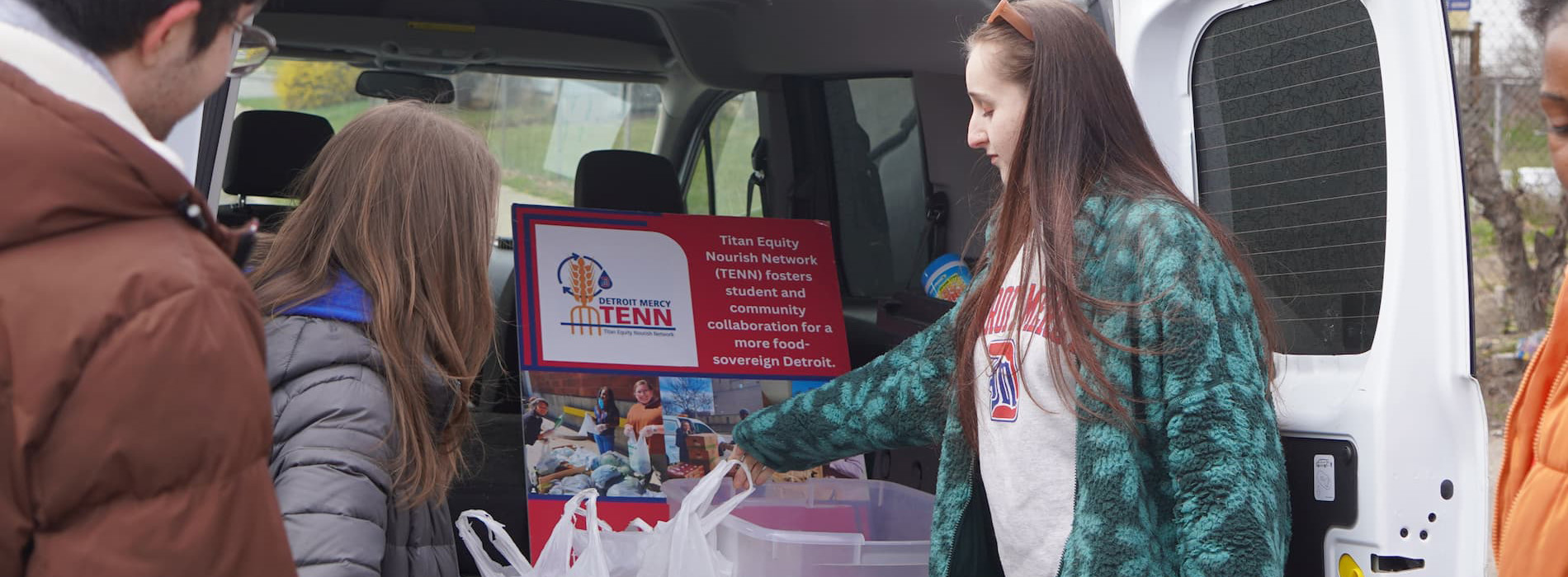 image of students around a van with TENN sign