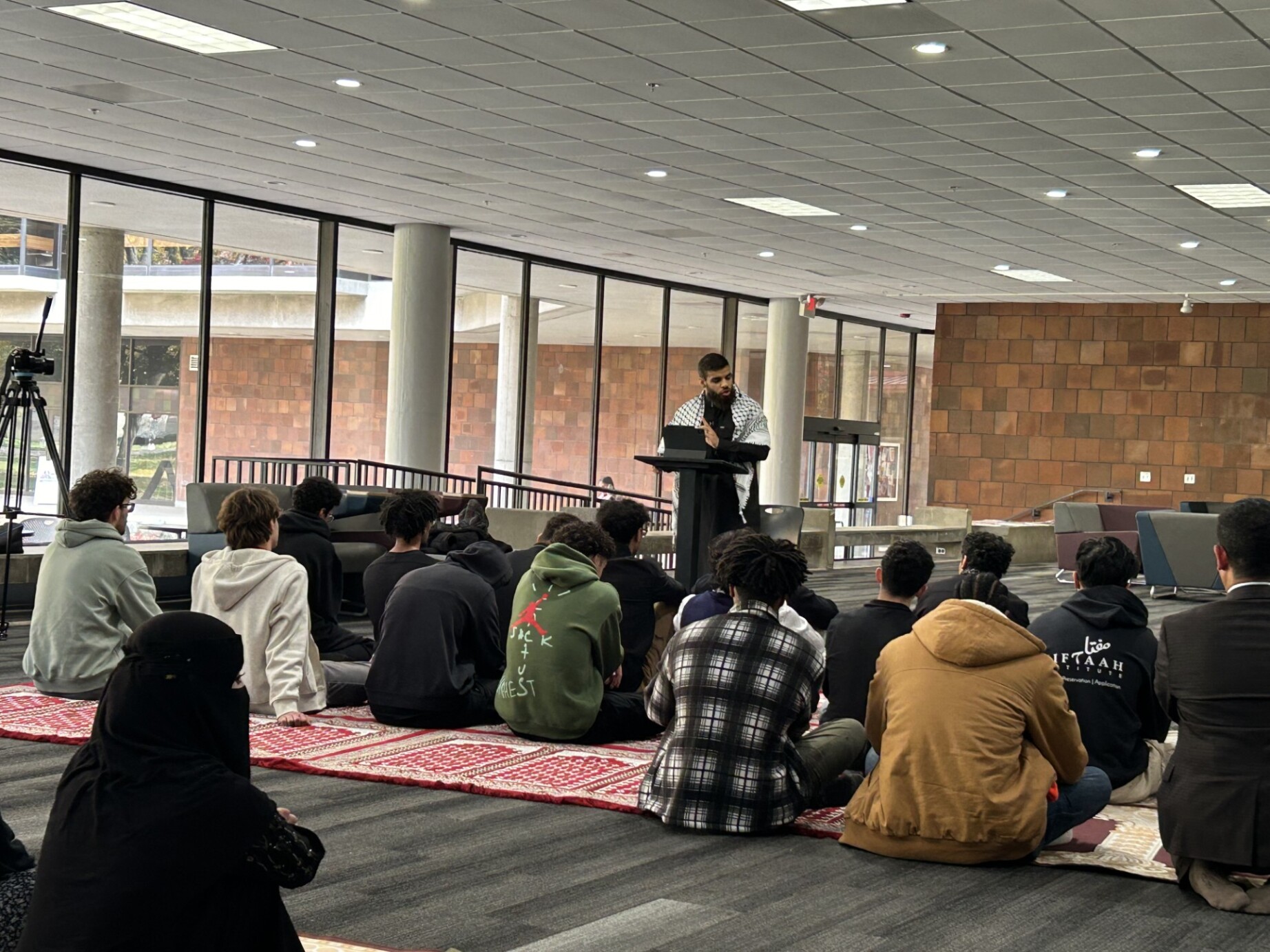 Jummah Prayer in Fountain Lounge - students praying